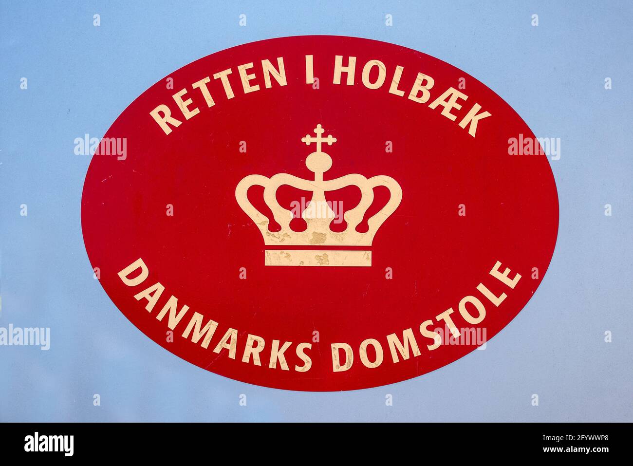 red logo of the Royal court in holbaek on a light blue background, Holbaek, Denmark, May 28, 2021 Stock Photo