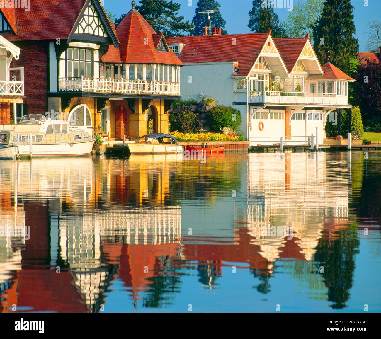 UK, England, Oxfordshire, Henley-on-Thames, boathouses on riverside, Stock Photo