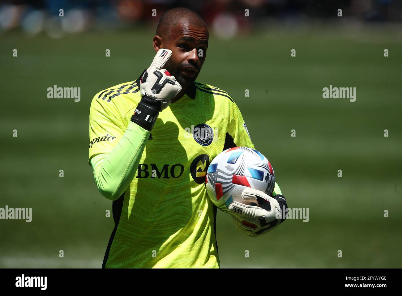 CF Montréal goalkeeper Clement Diop (23) points during a MLS match against the Chicago Fire FC at Soldier Field, Saturday, May 29, 2021, in Chicago, I Stock Photo
