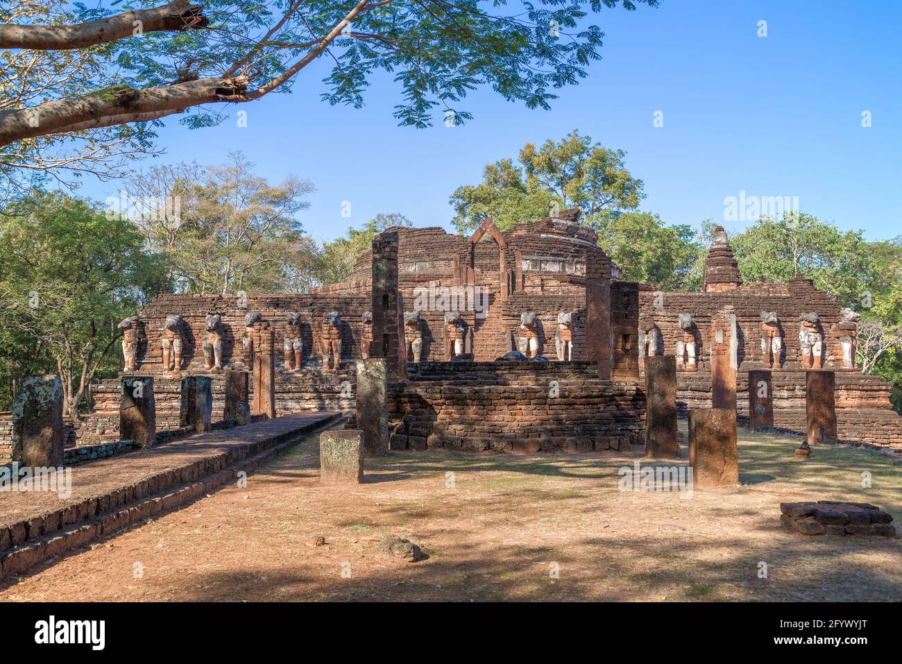 Ruins of the ancient Buddhist temple Wat Chang Rob on a sunny day. Kamphaeng Phet. Thailand Stock Photo