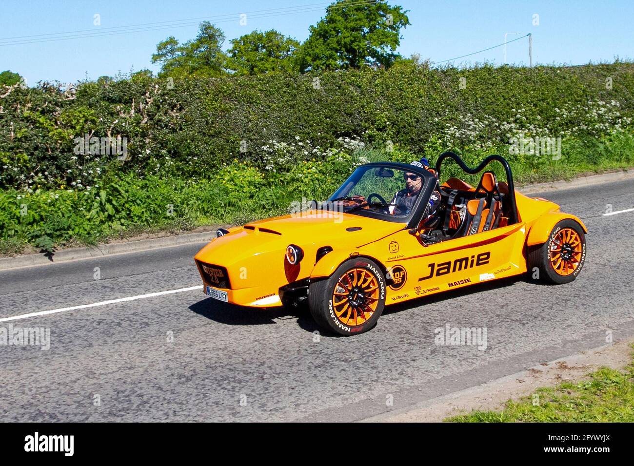 2017 Mev Mevster orange Jamie kit car; A limited edition rare car based on  the Mazda MX5. traffic, moving vehicles, cars, vehicle driving, UK roads,  motors, motoring en-route to Capesthorne Hall classic