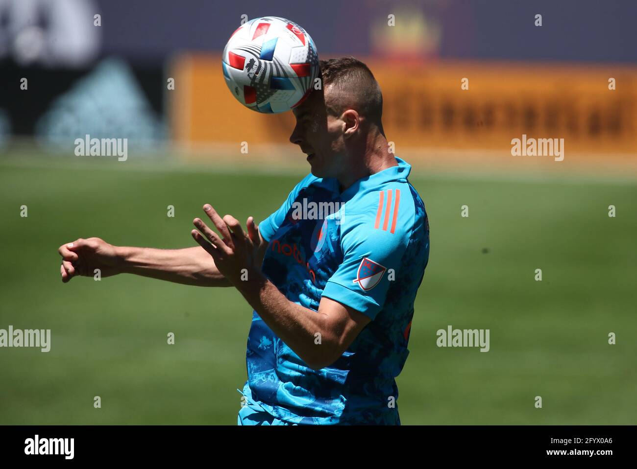 Chicago Fire FC defender Boris Sekulic (2) hits the ball with his head during a MLS match against the CF Montréal at Soldier Field, Saturday, May 29, Stock Photo