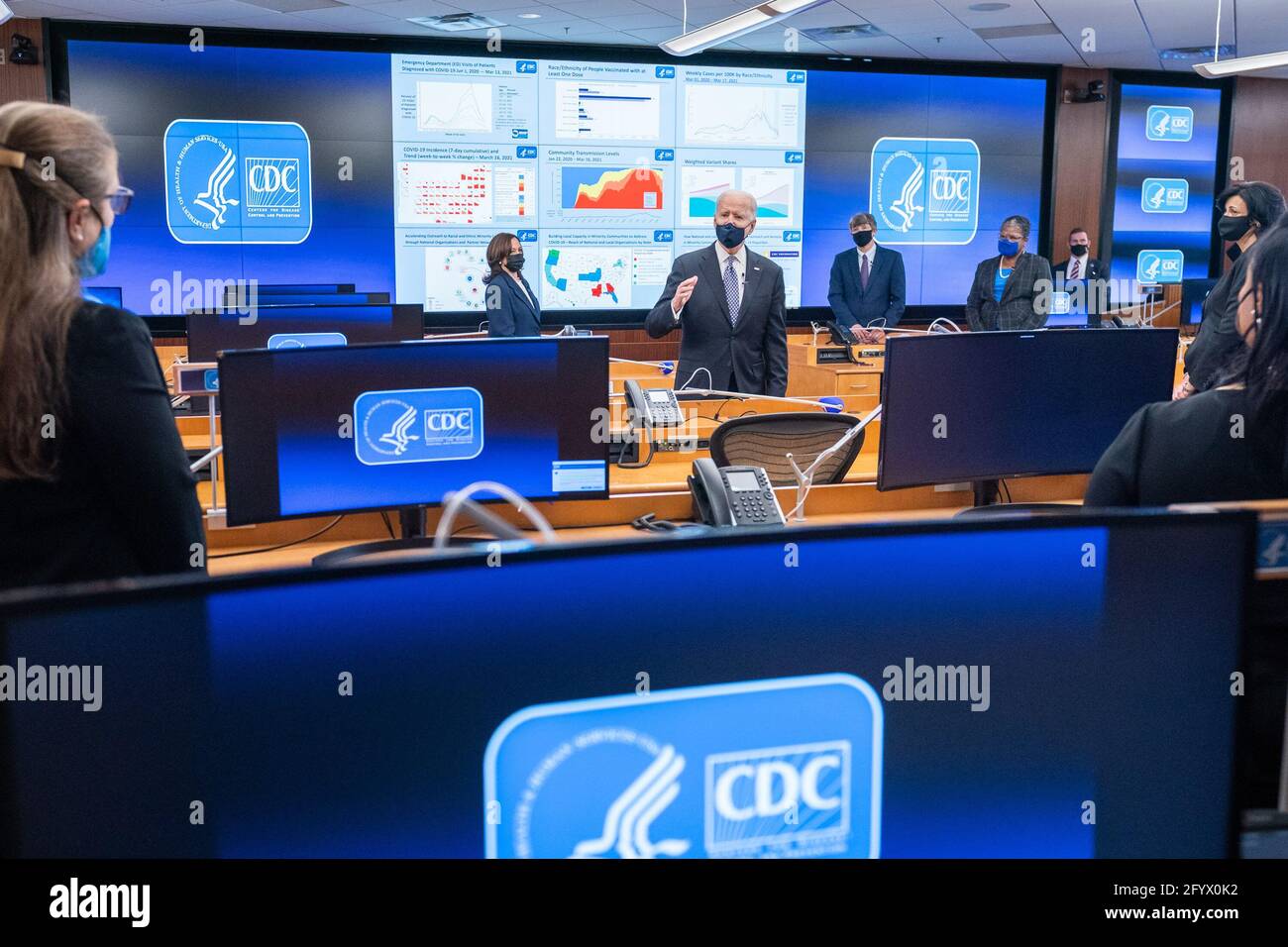 President Joe Biden, joined by Vice President Kamala Harris and Director of the Centers for Disease Control (CDC) Dr. Rochelle Walensky, talks with CDC staff during a briefing Friday, March 19, 2021, at the CDC headquarters in Atlanta. (Official White House Photo by Adam Schultz) Stock Photo