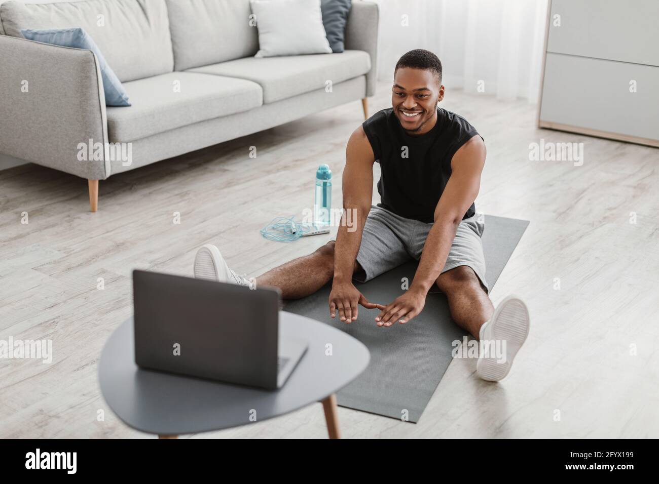 Happy man doing stretching hi-res stock photography and images - Alamy