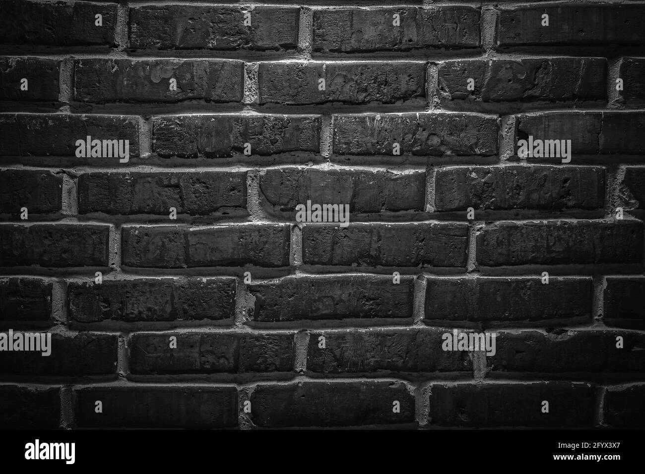 Black or dark gray sanded old loft brick wall texture background Stock Photo
