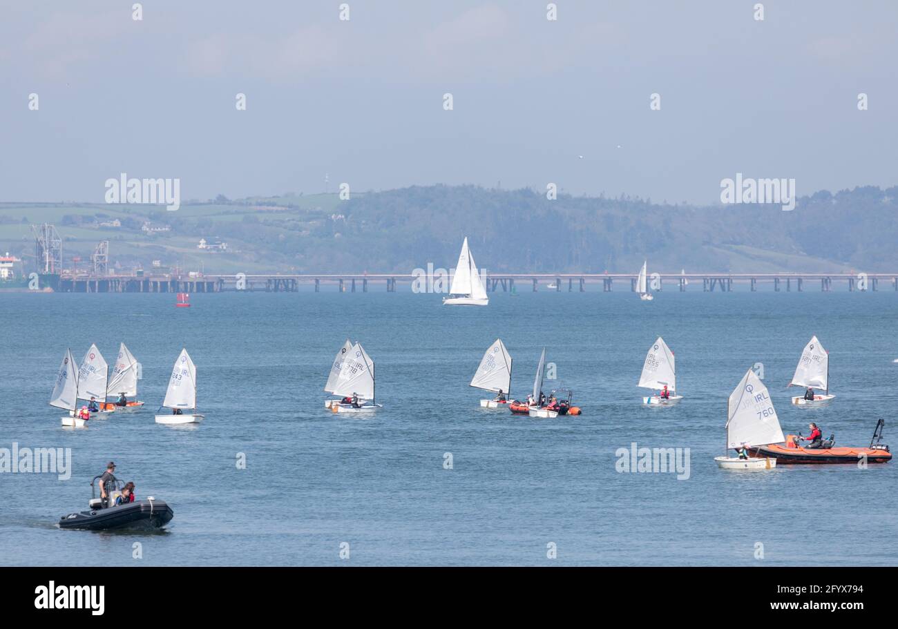 Currabinny,Cork, Ireland. 30th May, 2021.  With the lifting of Government restrictions  a group of optimist dinghies and yachts from the Royal Cork Yacht Club return to the water on a fine summers day in Cork Harbour,  Ireland.   - Credit; David Creedon / Alamy Live News Stock Photo