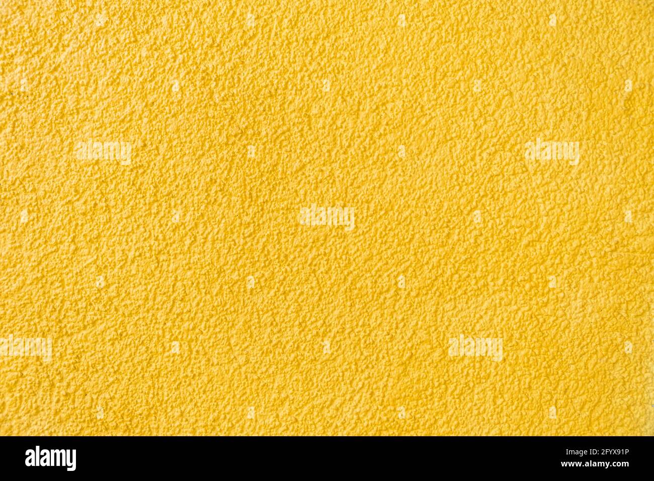 Old yellow stone wall background texture sandstone Stock Photo
