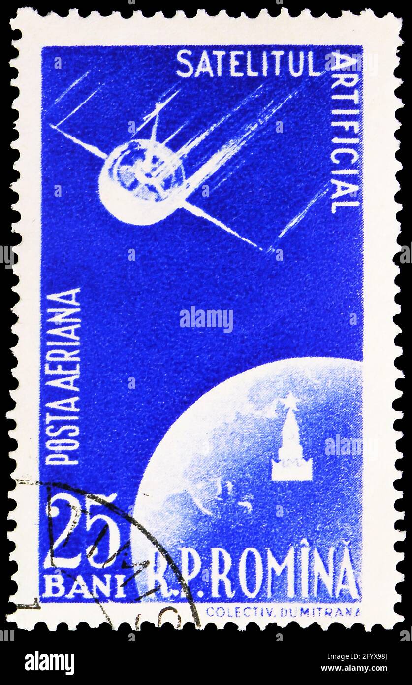 MOSCOW, RUSSIA - SEPTEMBER 27, 2019: Postage stamp printed in Romania shows Artificial satellite encircling globe, Launch of the First Soviet Earth Sa Stock Photo