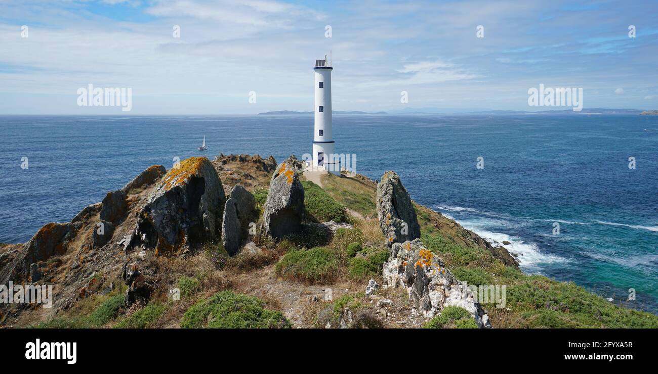 Lighthouse on the coast of Galicia in Spain, Atlantic ocean, Cabo Home, Pontevedra province, Cangas Stock Photo