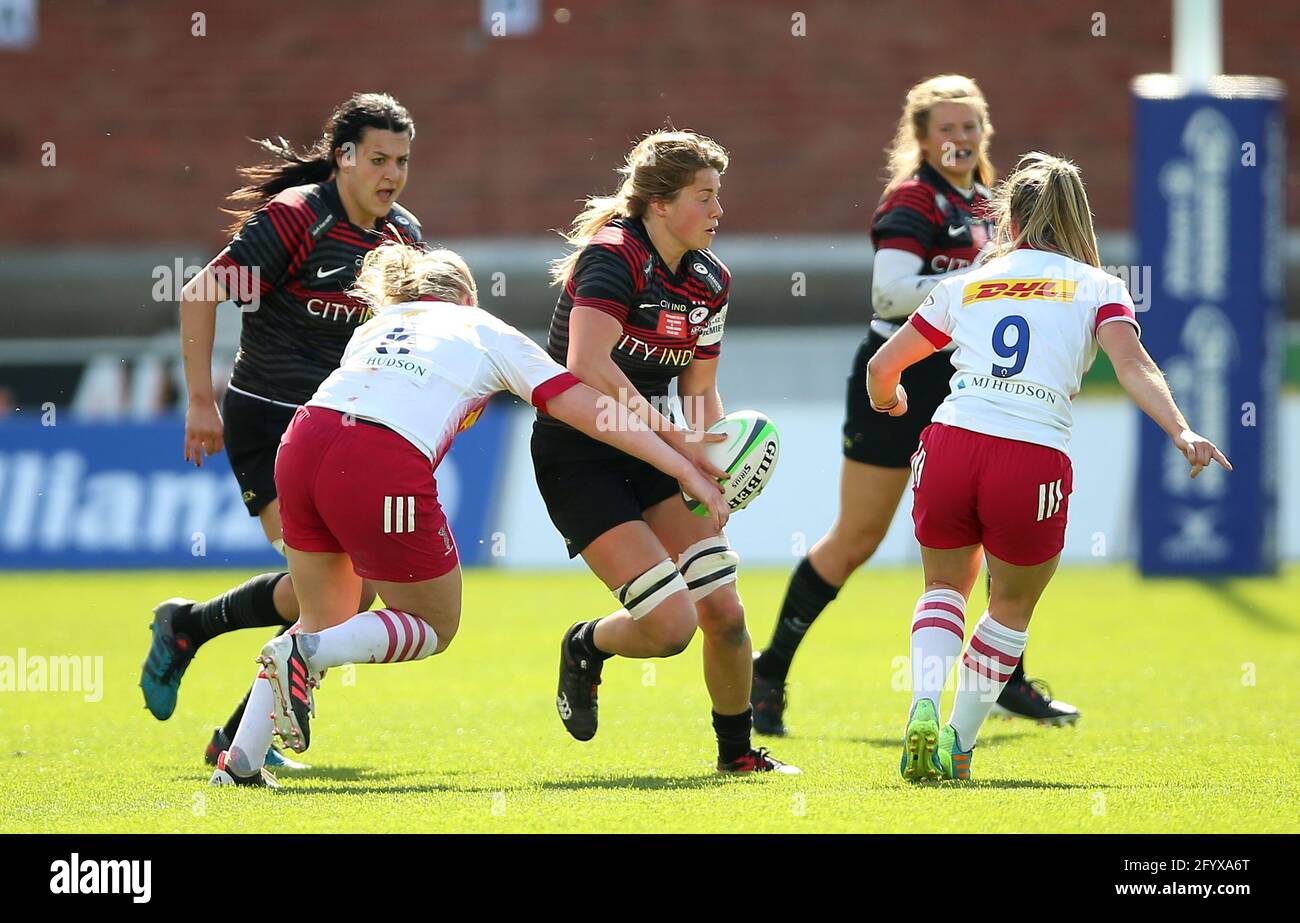 Saracens' Sophie de Goede is tackled by Harlequins' Lauren Brooks (left) during the Allianz Premier 15s final at the Kingsholm Stadium, Gloucester. Picture date: Sunday May 30, 2021. Stock Photo