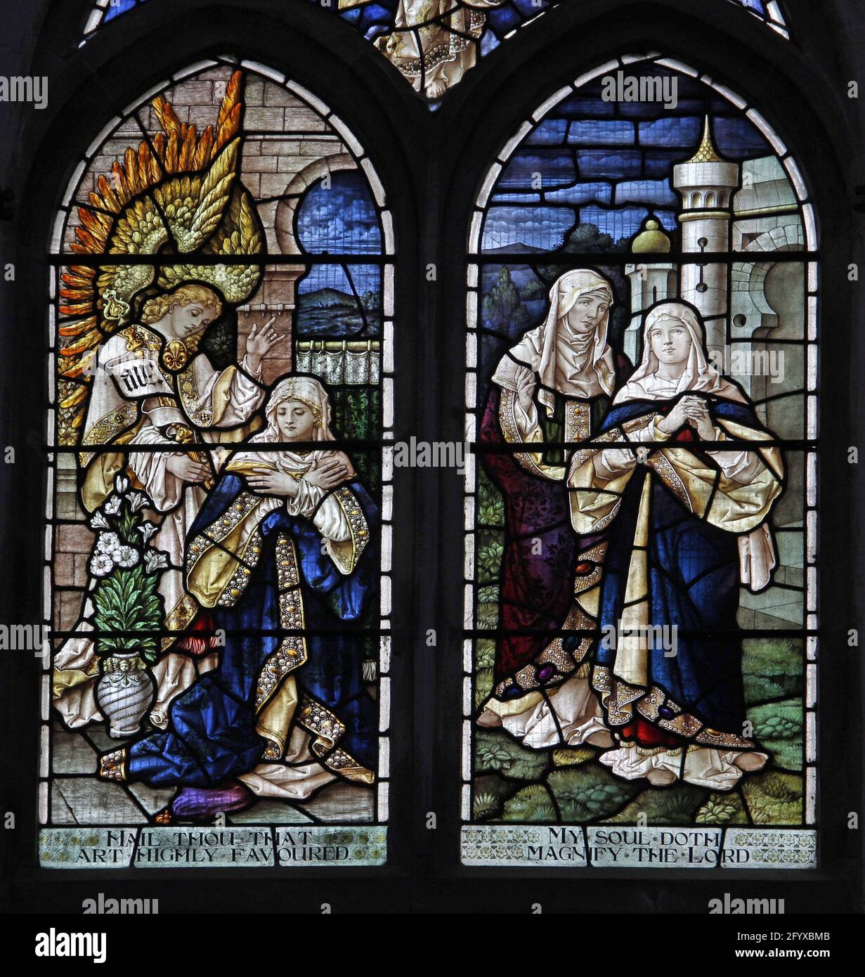 Stained glass window depicting The Annunciation and Visitation, Lady St Mary  Church, Wareham, Dorset Stock Photo