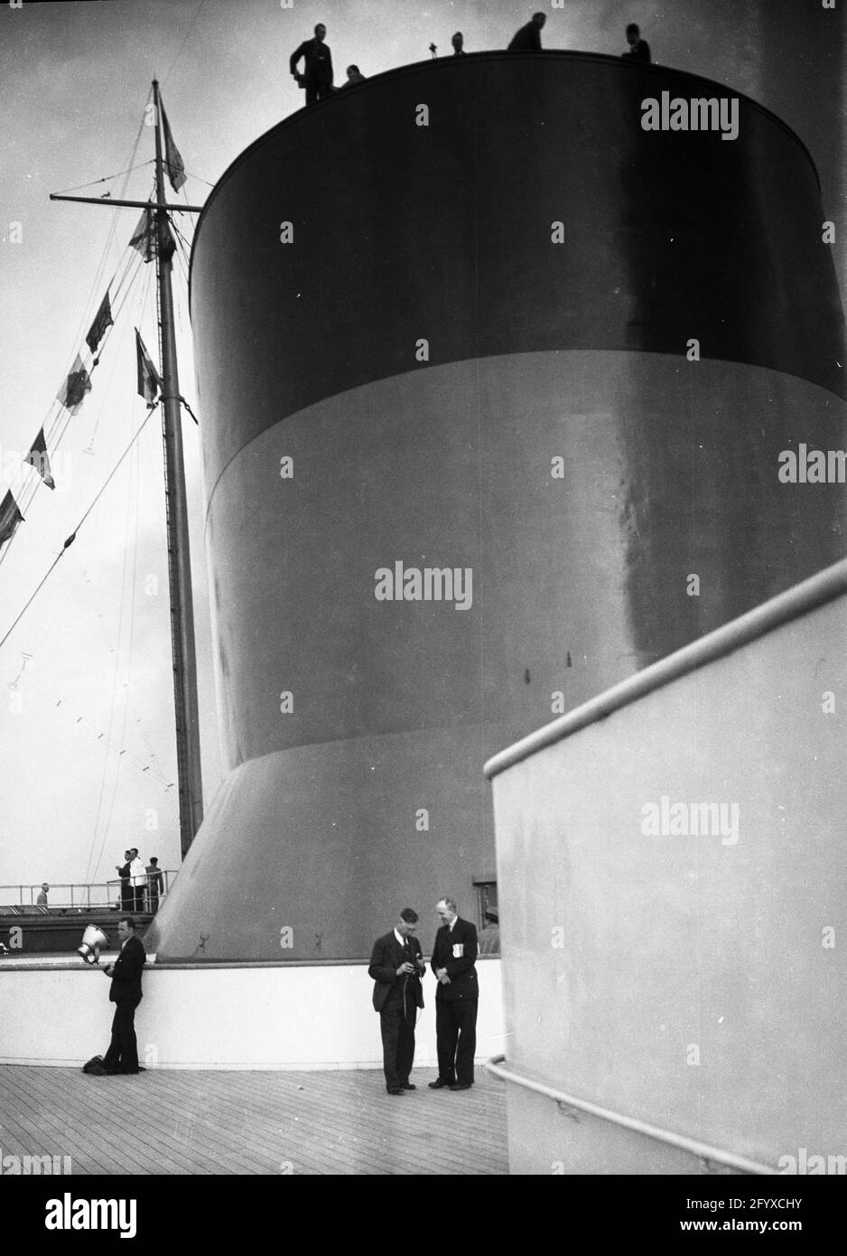 The funnel of the French Line's SS Normandie on the ocean liner's maiden voyage, New York City, 1935. (Photo by Burton Holmes) Stock Photo