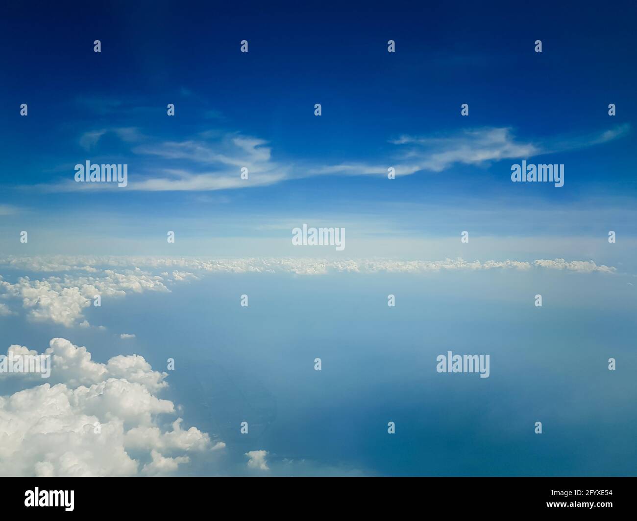 Beautiful blue sky with white fluffy clouds Stock Photo - Alamy