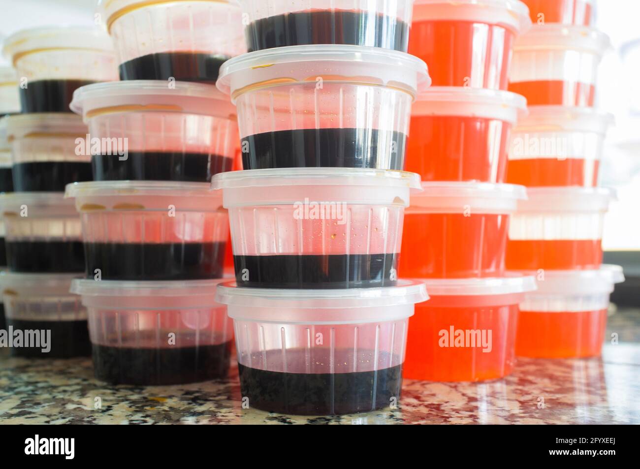 Soy and sweet and sour sauce bowls. Soy sauce, soya, sweet and sour