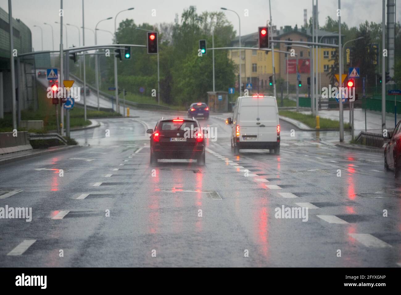 Warsaw, Poland May 19, 2021 Cars in the rain. Traffic in the city in