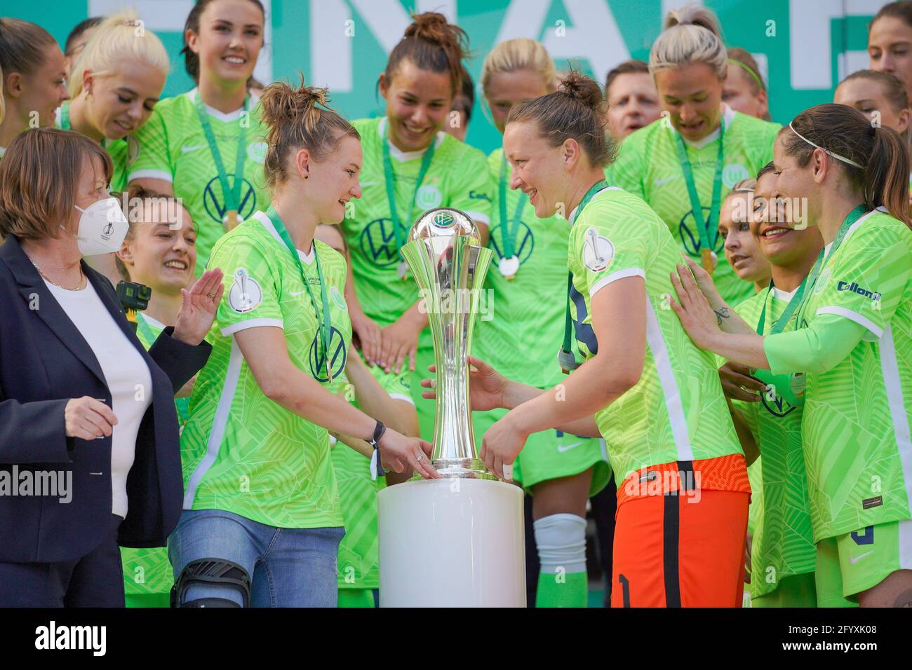 Cologne, Germany. 30th May, 2021. Vfl Wolfsburg celebrate their winning of the DFB Pokal (here Alexandra Popp and Almuth Schult with the trophy) at the DFB Women Cup Final match between Eintracht Frankfurt and VfL Wolfsburg at RheinEnergieSTADION in Cologne, Germany. Credit: SPP Sport Press Photo. /Alamy Live News Stock Photo