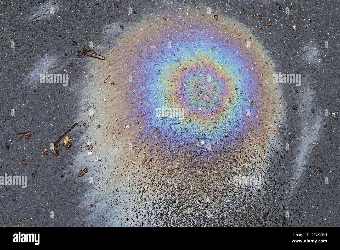 Road spillage oil spill and debris on asphalt. Abstract background. Stock Photo