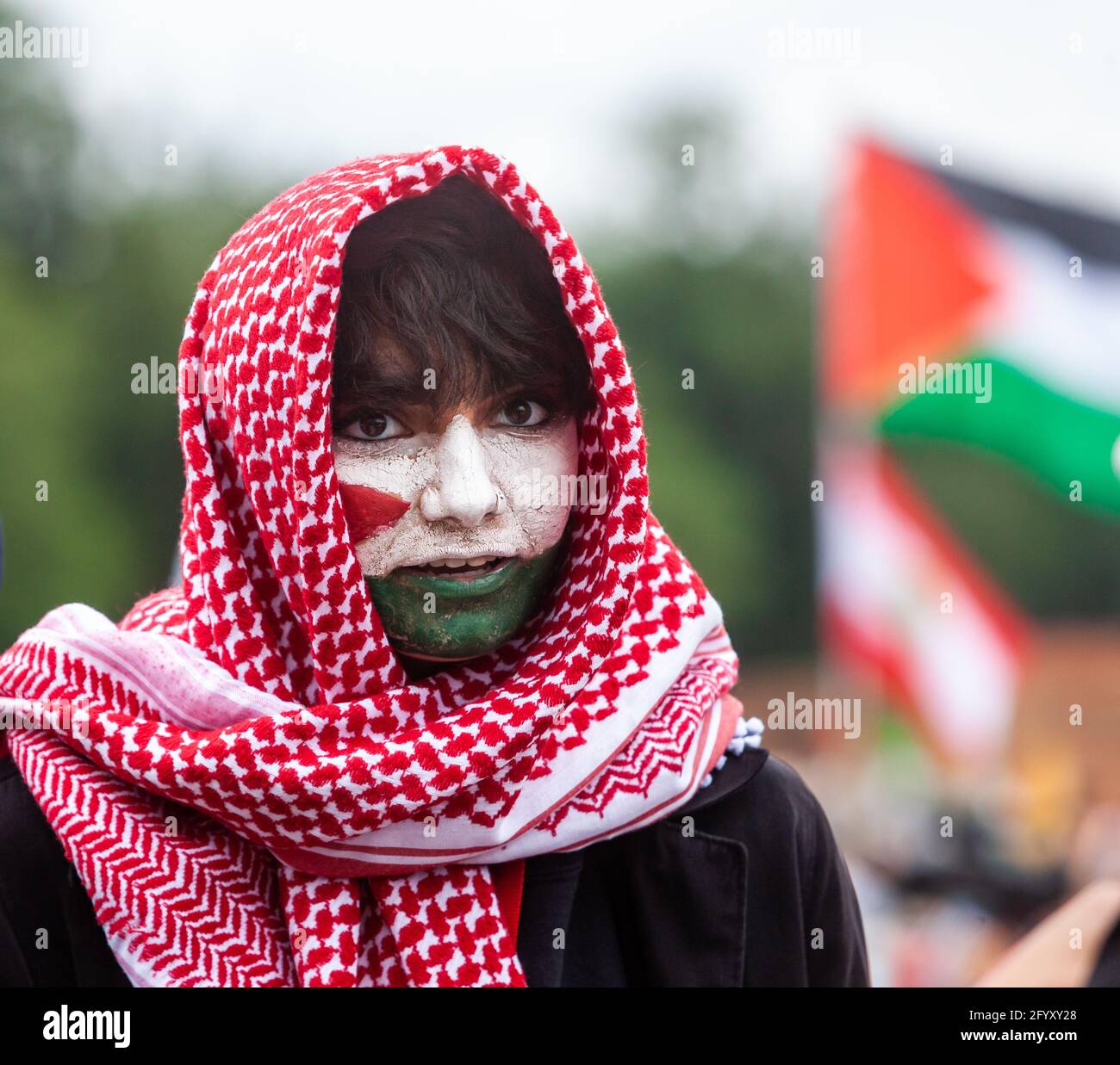 Washington, DC, USA, May 29, 2021.  Pictured: A member of the Palestinian Youth Movement at the National March for Palestine.  Thousands of people from the eastern half of the United States came to Washington to participate in the march.  American Muslims for Palestine and the US Council of Muslim Organizations co-hosted the event with 7 partnering organizations, and an additional 109 organizations endoresed the march.  Credit: Allison Bailey / Alamy Live News Stock Photo