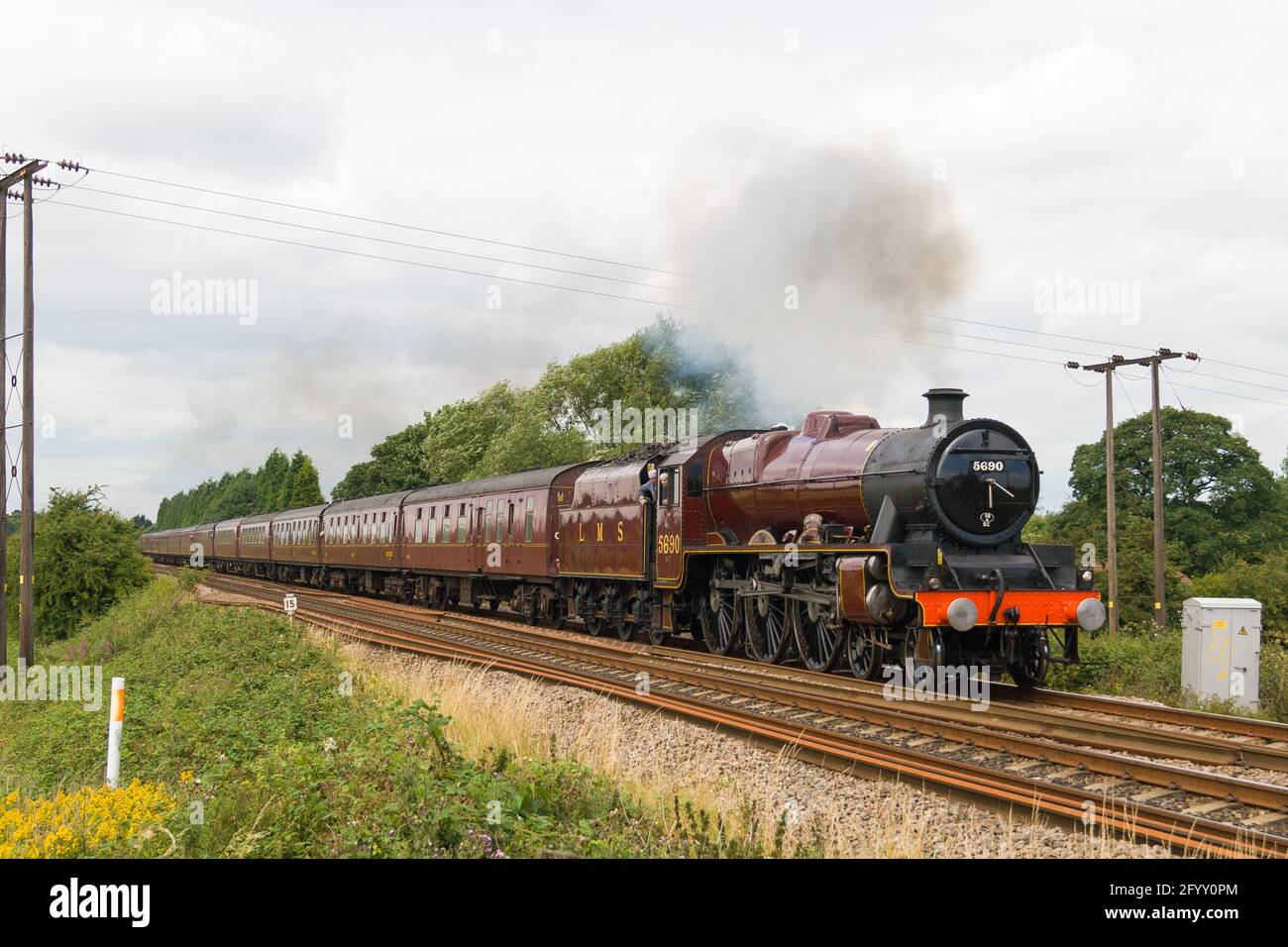 Leander on a mainline steam train Stock Photo