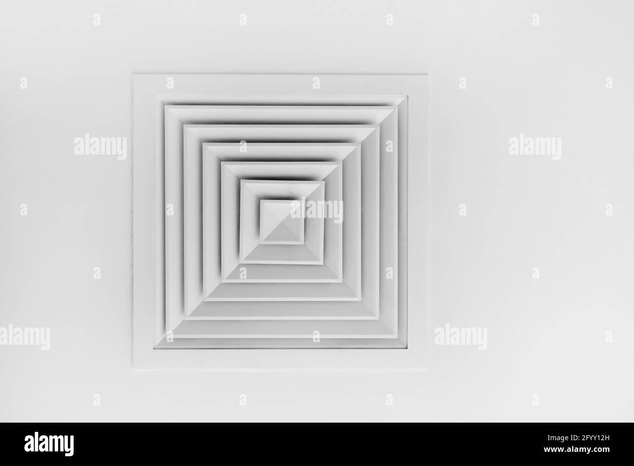 White square ventilation grill on the ceiling. Stock Photo