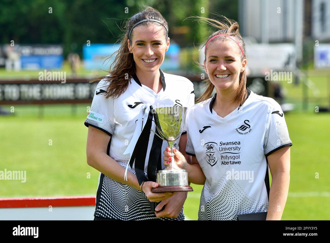 Neath, Wales. 30 May, 2021. Katy Hosford of Swansea City Ladies holding the WPWL trophy after the Orchard Welsh Premier Women's League match between Swansea City Ladies and Abergavenny Women at the Llandarcy Academy of Sport in Neath, Wales, UK on 30, May 2021. Credit: Duncan Thomas/Majestic Media/Alamy Live News. Stock Photo