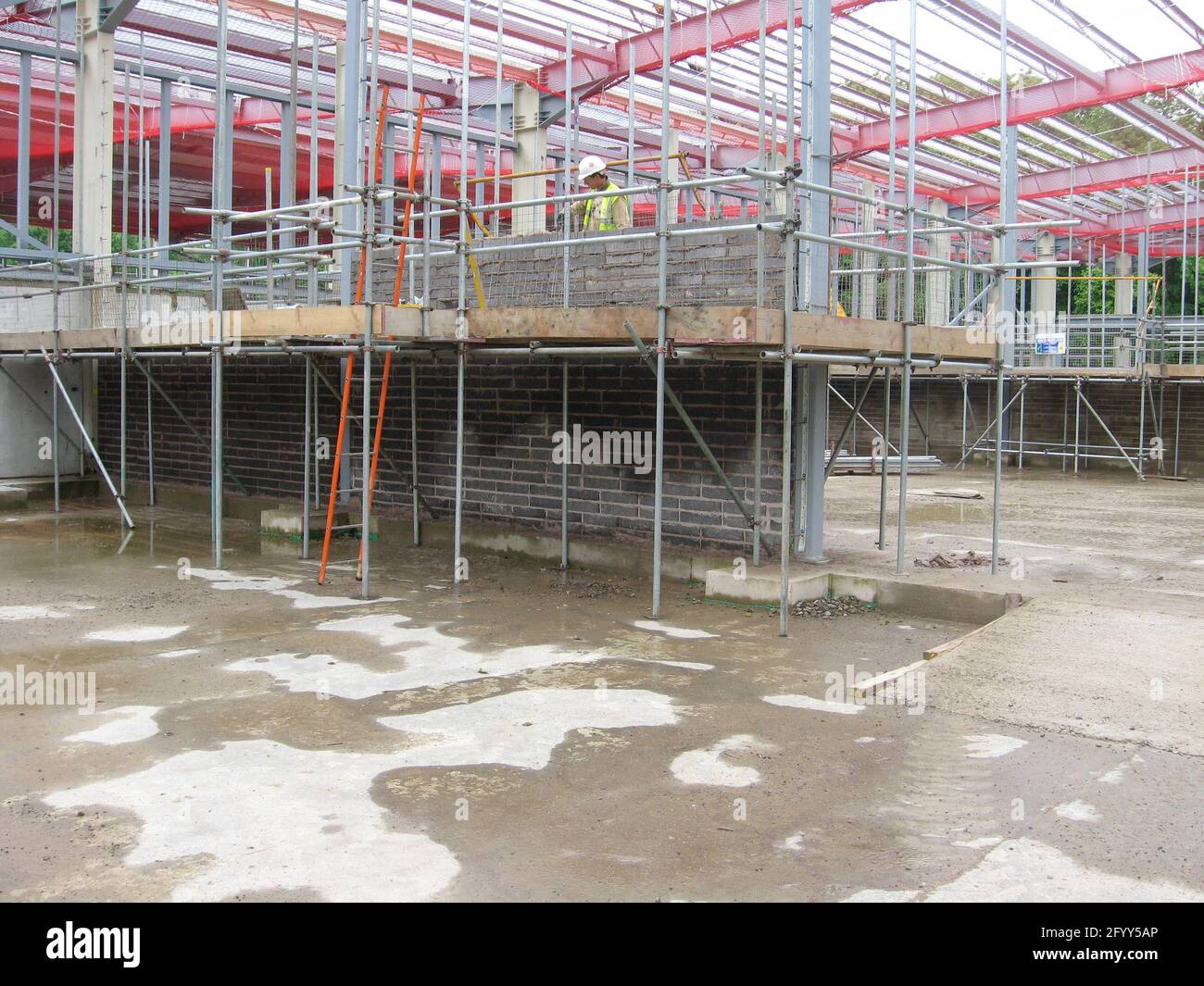 May 2008 - Structural block wall being built construction works Stock Photo