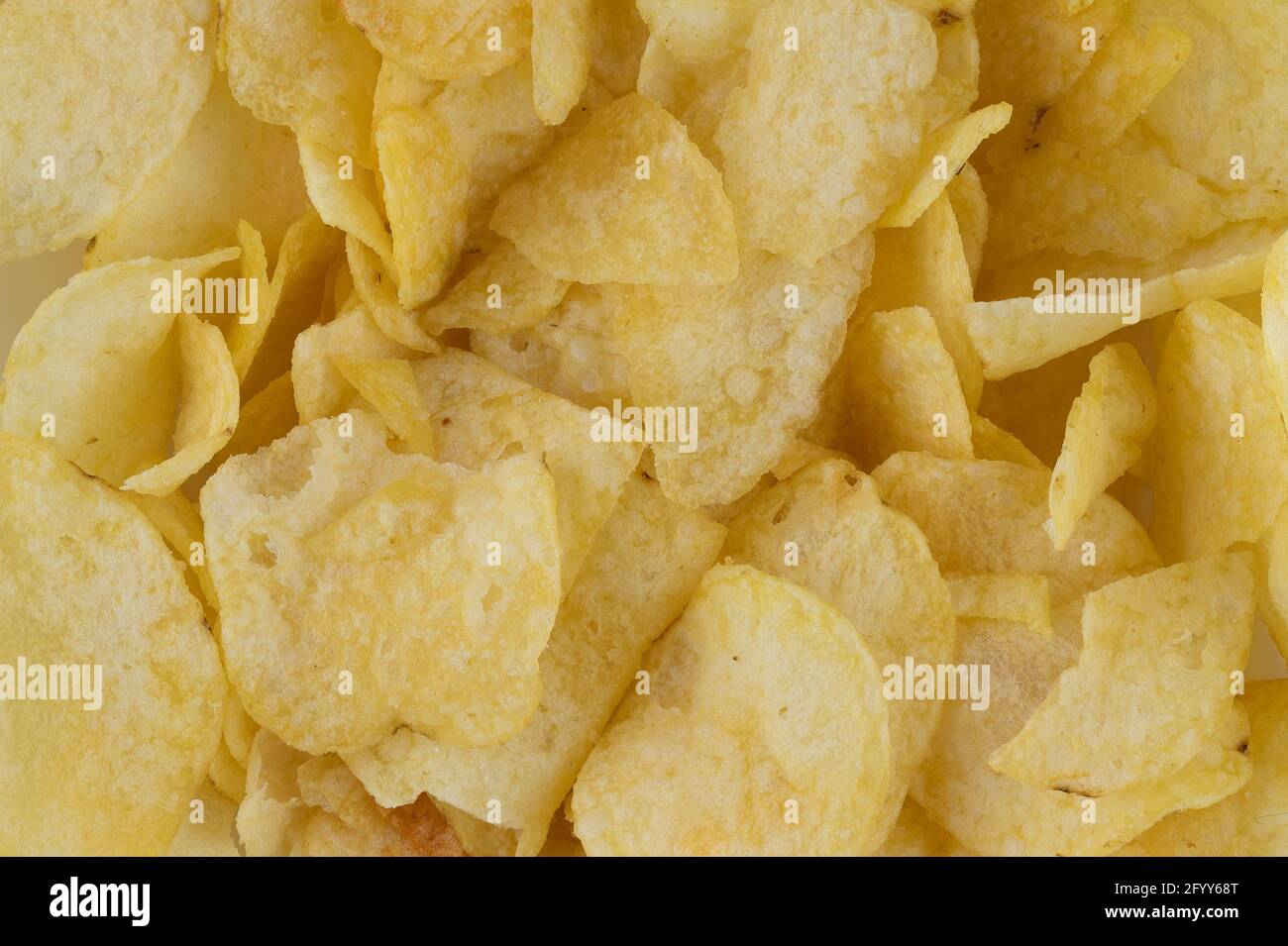 crispy potato chips snack texture background Stock Photo