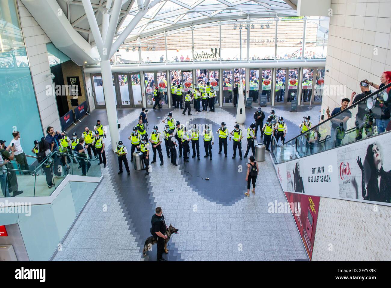 WHITE CITY, LONDON, ENGLAND- 29 May 2021: Protesters inside Westfield White City during a Unite For Freedom anti-lockdown protest in London Stock Photo