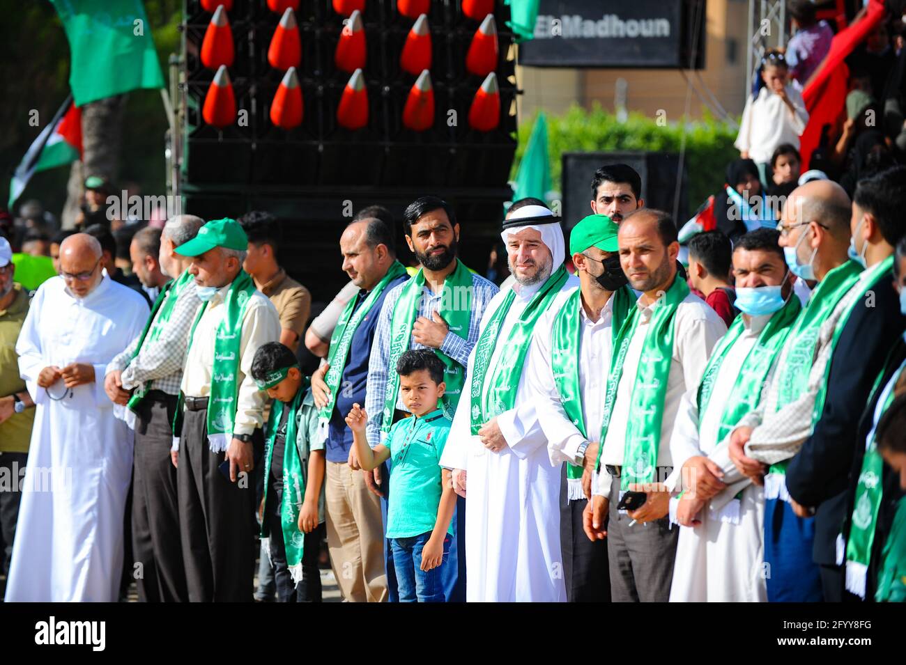 Under the leadership of wanted men of Hamas, Al-Qassam holds a celebration and a military parade to honor the families of the martyrs in northern Gaza Stock Photo