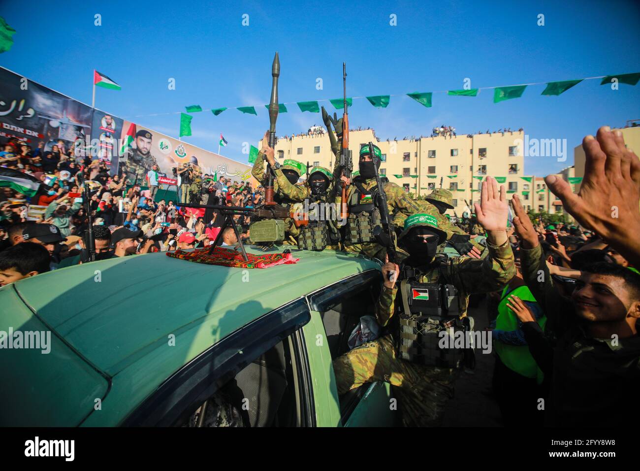 Under the leadership of wanted men of Hamas, Al-Qassam holds a celebration and a military parade to honor the families of the martyrs in northern Gaza Stock Photo
