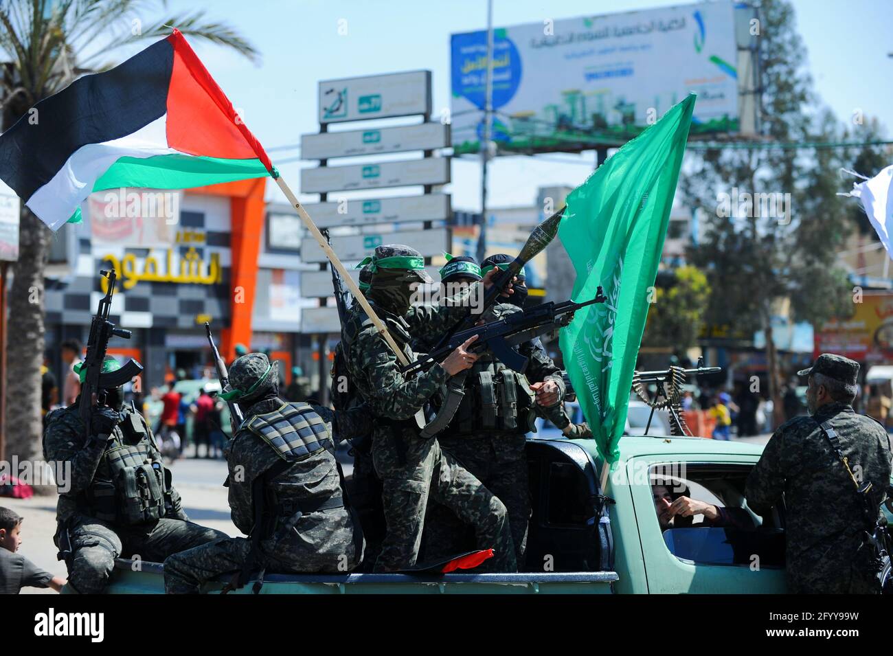 Under the leadership of wanted men of Hamas, Al-Qassam holds a celebration and a military parade to honor the families of the martyrs in northern Gaza Stock Photo