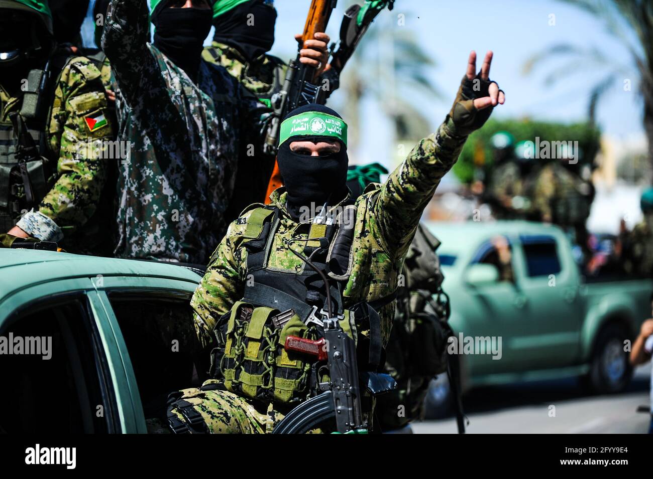 Under the leadership of wanted men of Hamas, Al-Qassam holds a celebration and a military parade to honor the families of the martyrs in northern Gaza Stock Photo