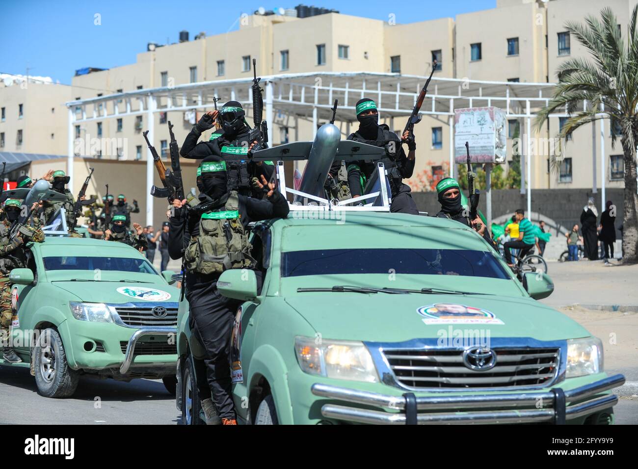 Under the leadership of wanted men of Hamas, Al-Qassam holds a celebration and a military parade to honor the families of the martyrs in northern Gaza Stock Photo