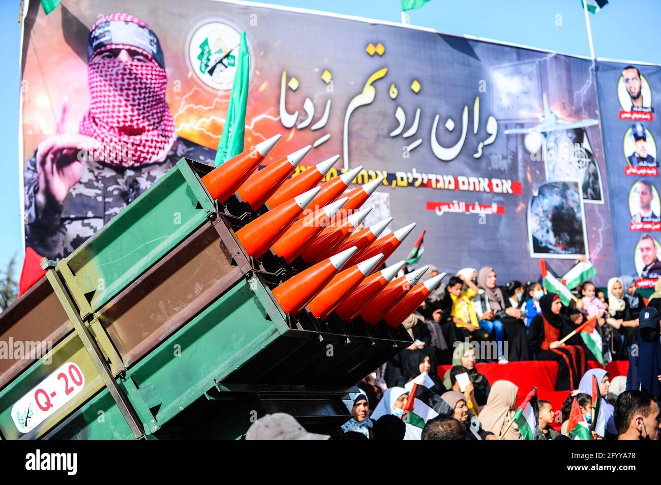 Under the leadership of wanted men of Hamas, Al-Qassam holds a celebration and a military parade to honor the families of the martyrs in northern Gaza Stock Photo