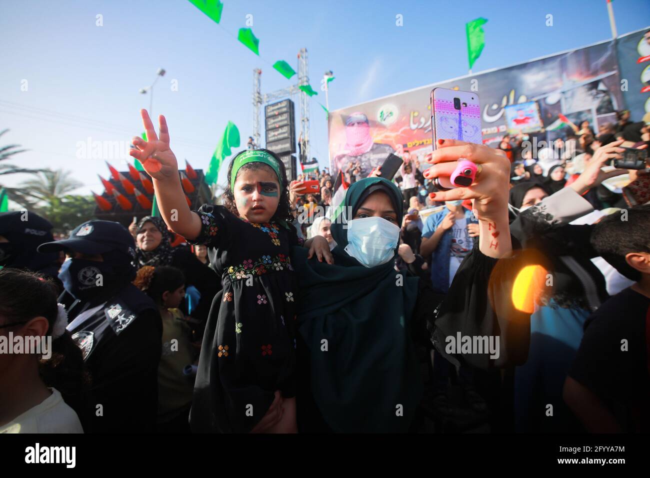 Under the leadership of wanted men of Hamas, Al-Qassam holds a celebration and a military parade to honor the families of the martyrs in northern Gaza Stock Photo