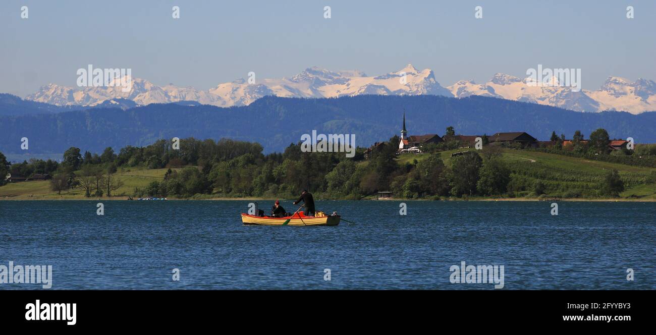 Idyllic landscape in Zurich Canton. Lake Pfaffikon and village Seegraben. Stock Photo