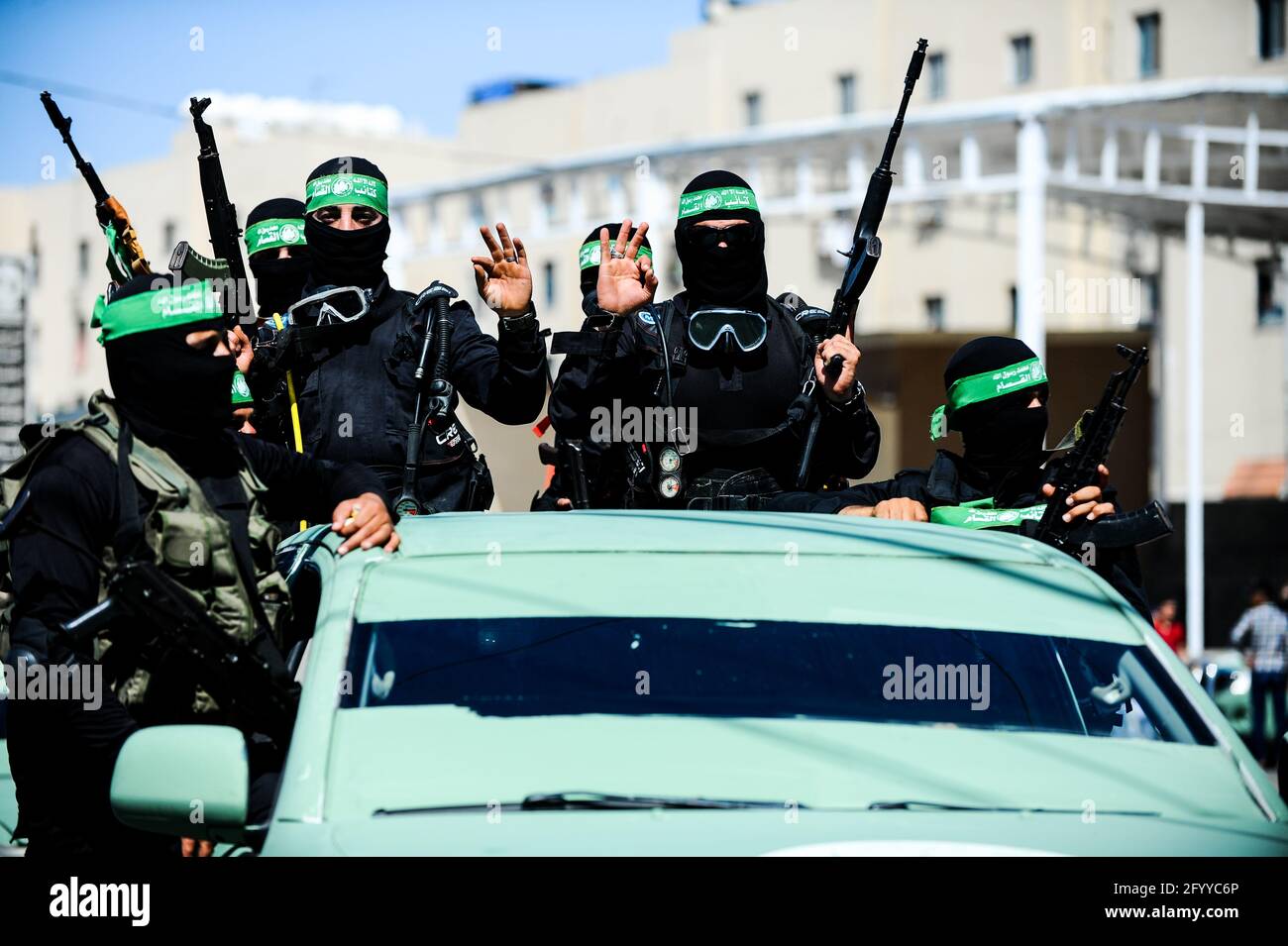 Under the leadership of wanted men of Hamas, Al-Qassam holds a celebration and a military parade to honor the families of the martyrs in northern Gaza Stock Photo