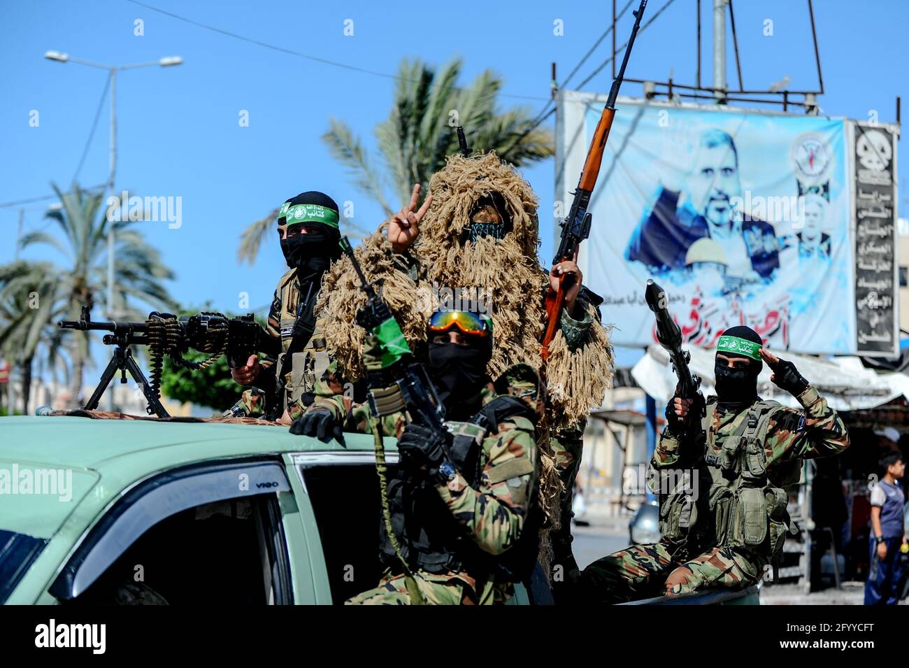 Under the leadership of wanted men of Hamas, Al-Qassam holds a celebration and a military parade to honor the families of the martyrs in northern Gaza Stock Photo