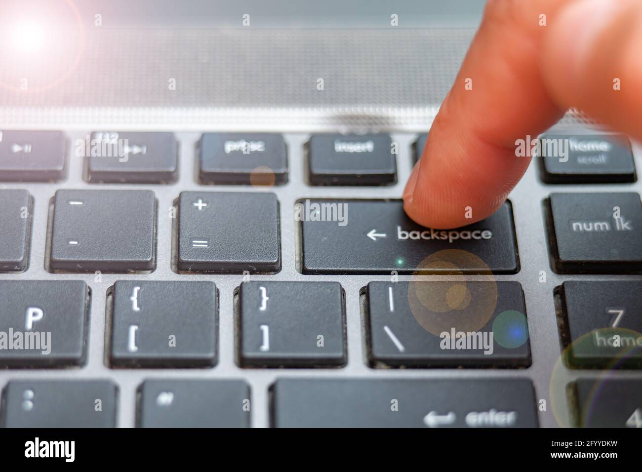 Backspace button pressing a lot of times on keyboard, laptop keyboard close  up Stock Photo - Alamy