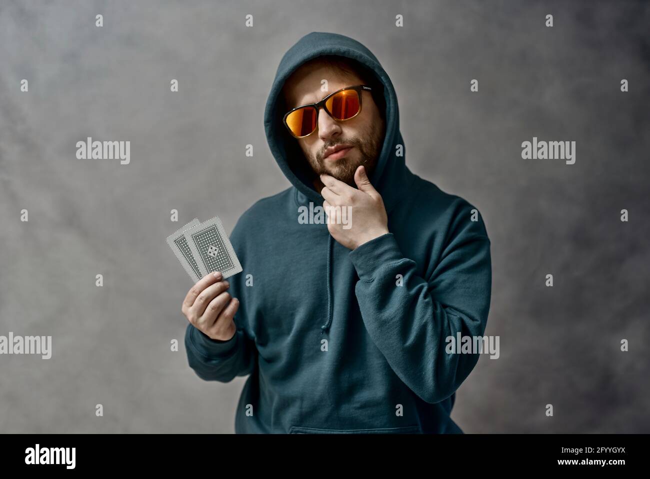 Man playing poker Stock Photo