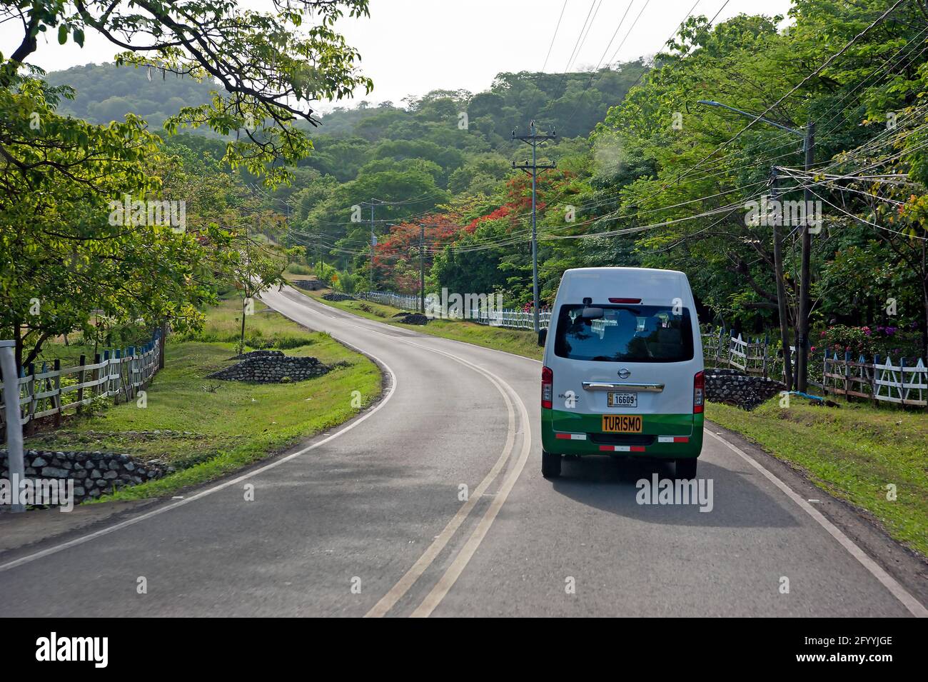 Tourist vehicle driving on Road in Costa Rica Stock Photo