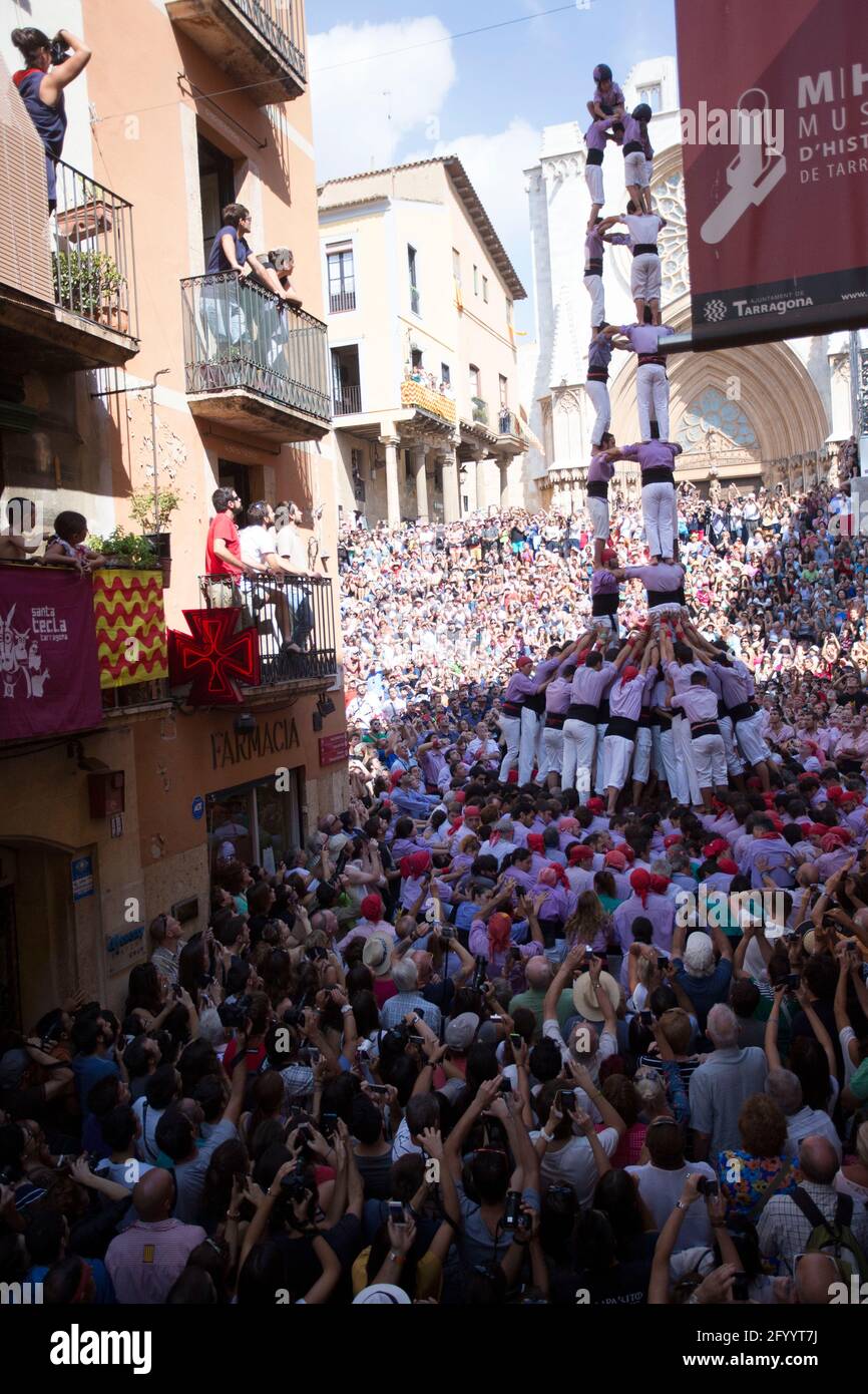 Tarragona, Spain, September 19, 2019 - Human Castells Tower on crowd of tourists Stock Photo