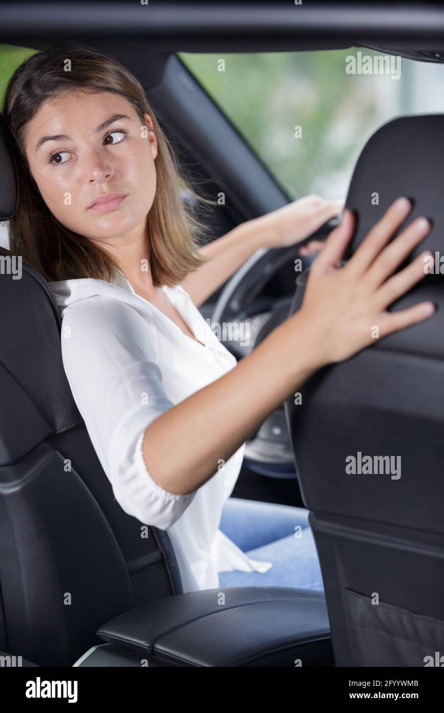 woman driving a car in reverse Stock Photo Alamy