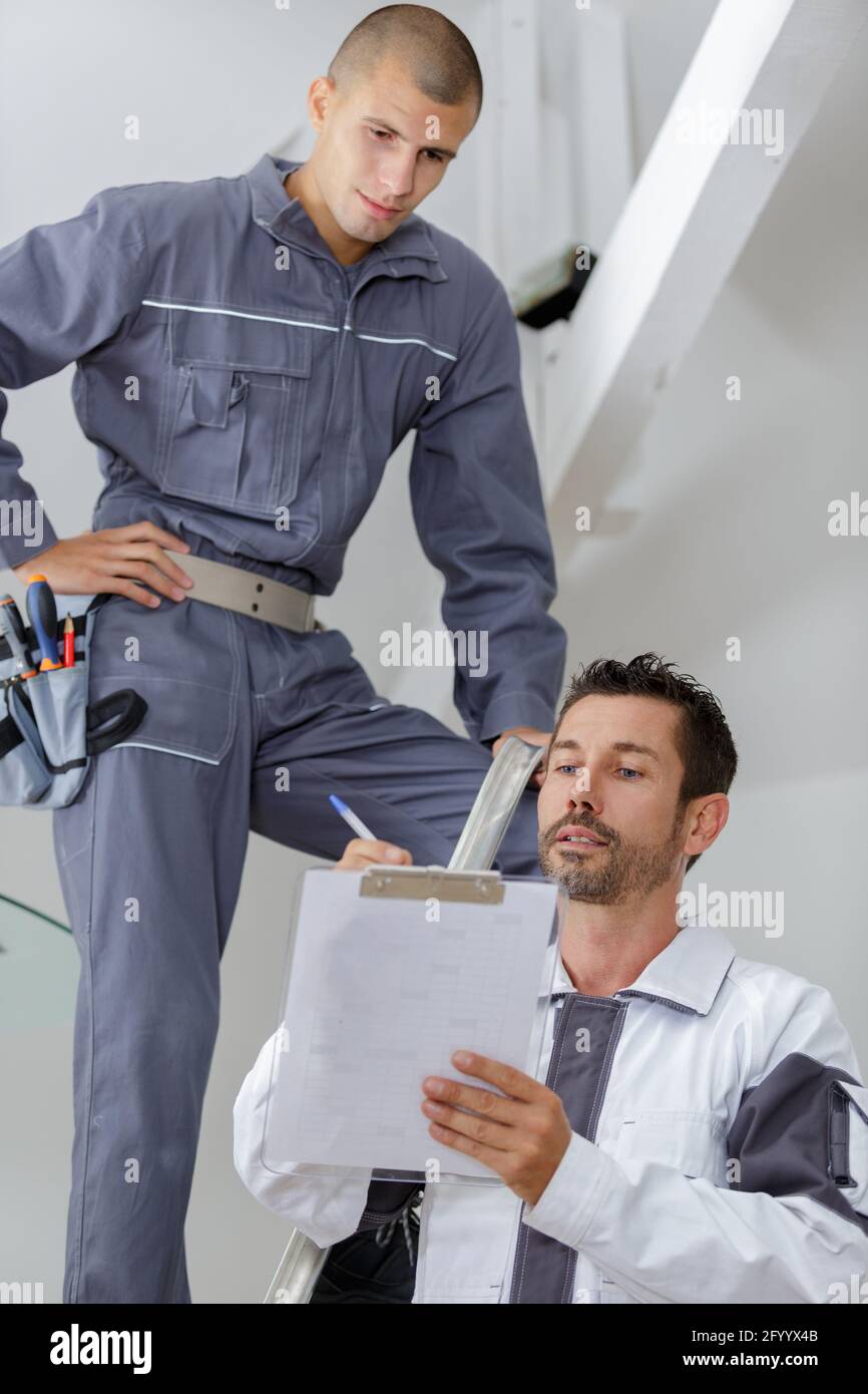 Engineer apprentice plans not woman hi-res stock photography and images ...