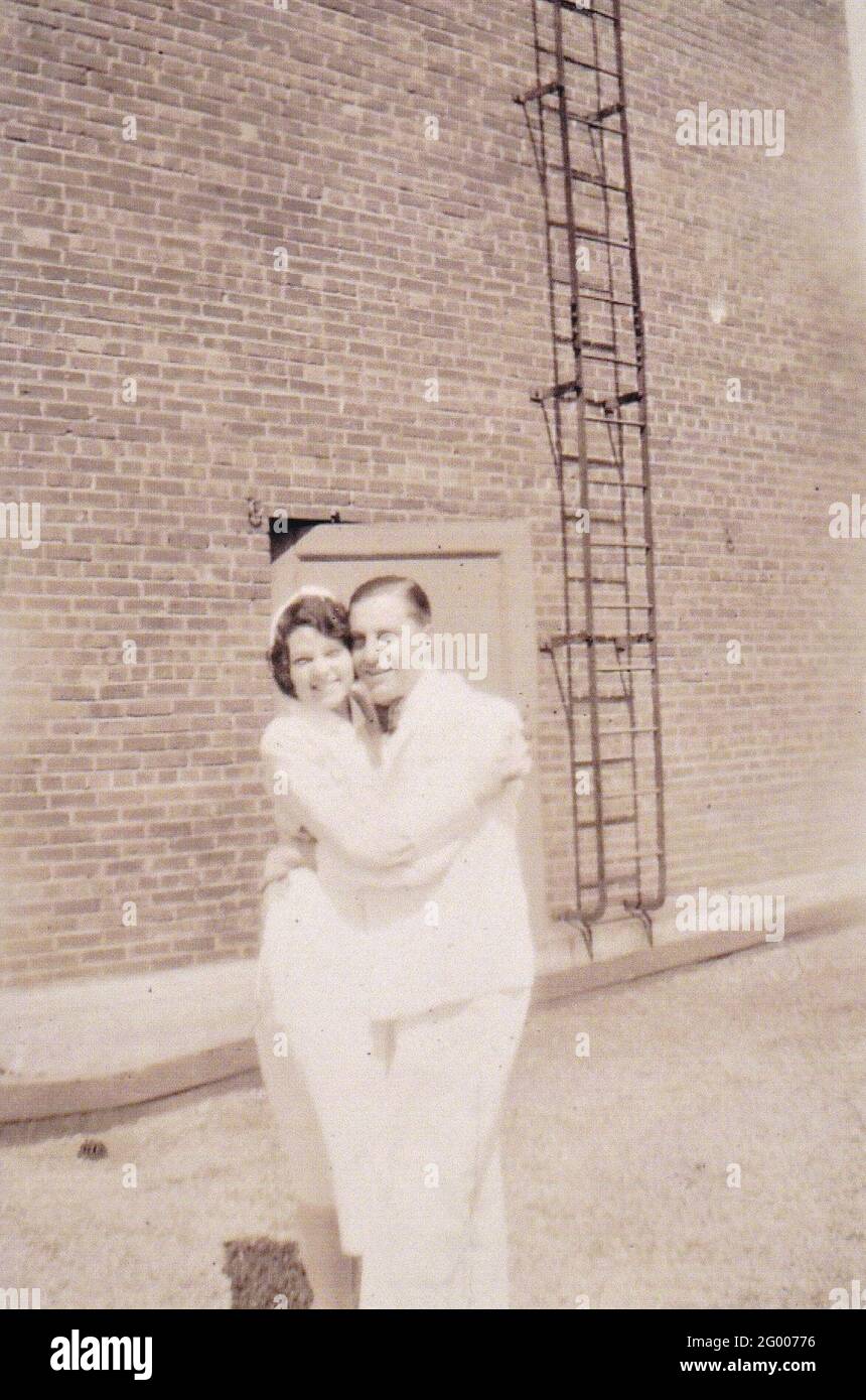Boston MA healthcare professionals hug outside circa 1932 vintage black and white stock photo Stock Photo