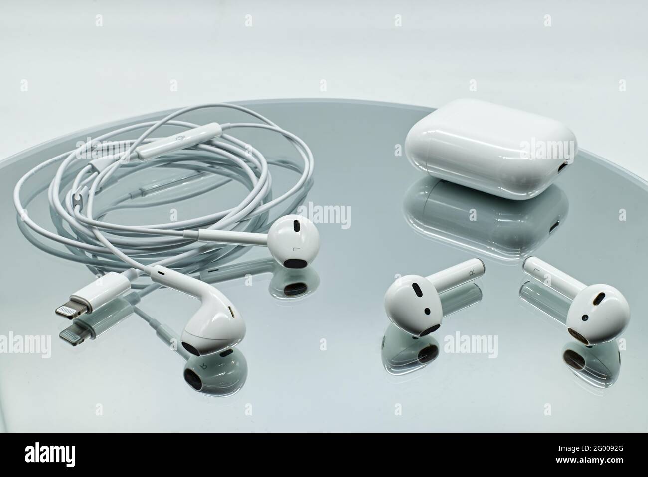 Air pods headphones hi-res stock photography and images - Alamy