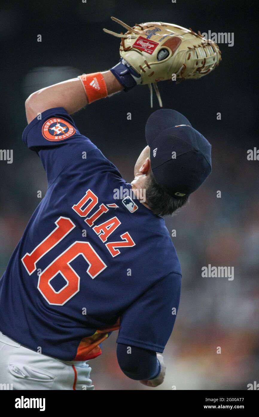 May 30, 2021: Astros first baseman Aledmys Díaz (16) makes a catch