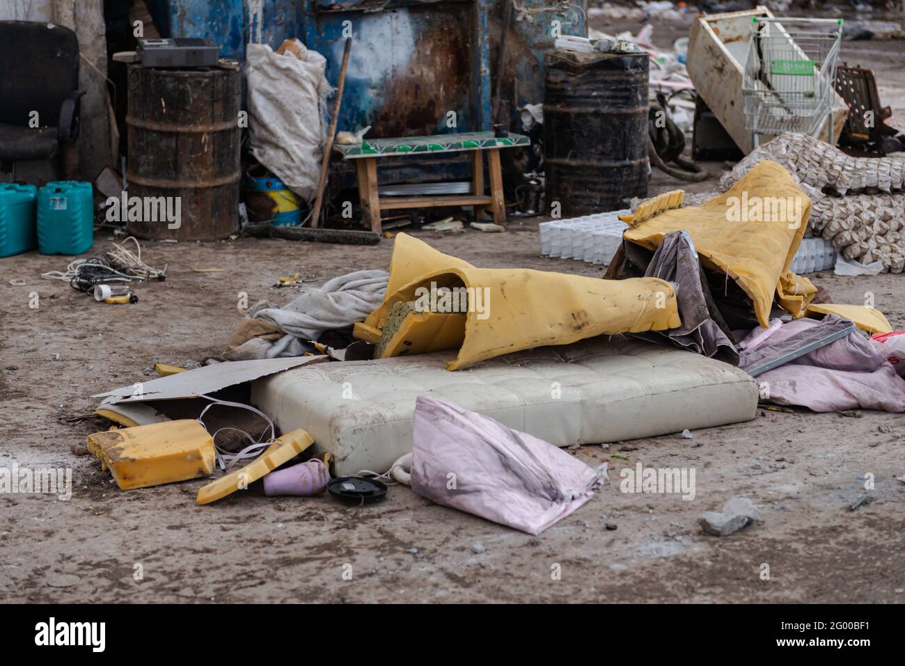 Disassembly of old mattresses. At the landfill, old mattresses are