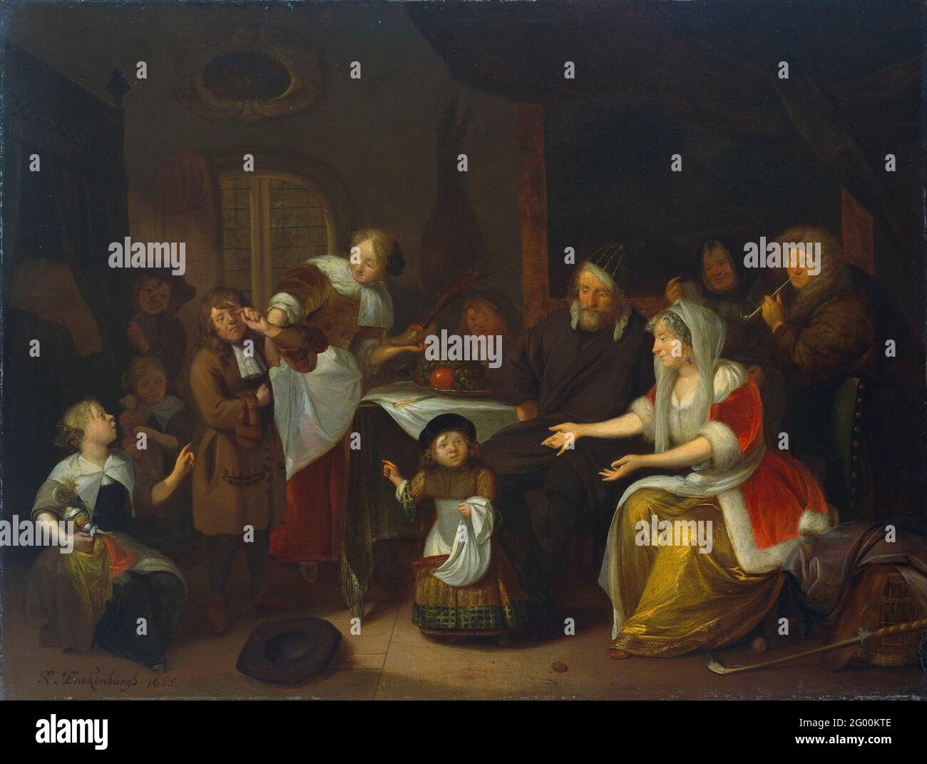 The Feast Of St Nicholas. The Sint Nicolaas party. Interior in which a family with children celebrates Sinterklaas. Children walk around a table with their gifts. On the left is a girl with a doll, behind it a crying boy who has received a ru. On the right lies a kolf stick on the ground. Stock Photo
