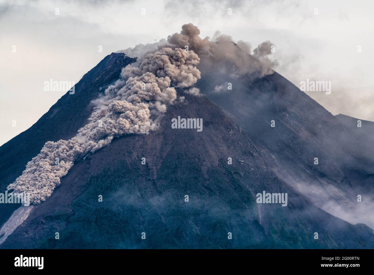 Merapi volcanic eruption seen from the Pakem village on January 27, 2021 in Yogyakarta Province, Indonesia Stock Photo